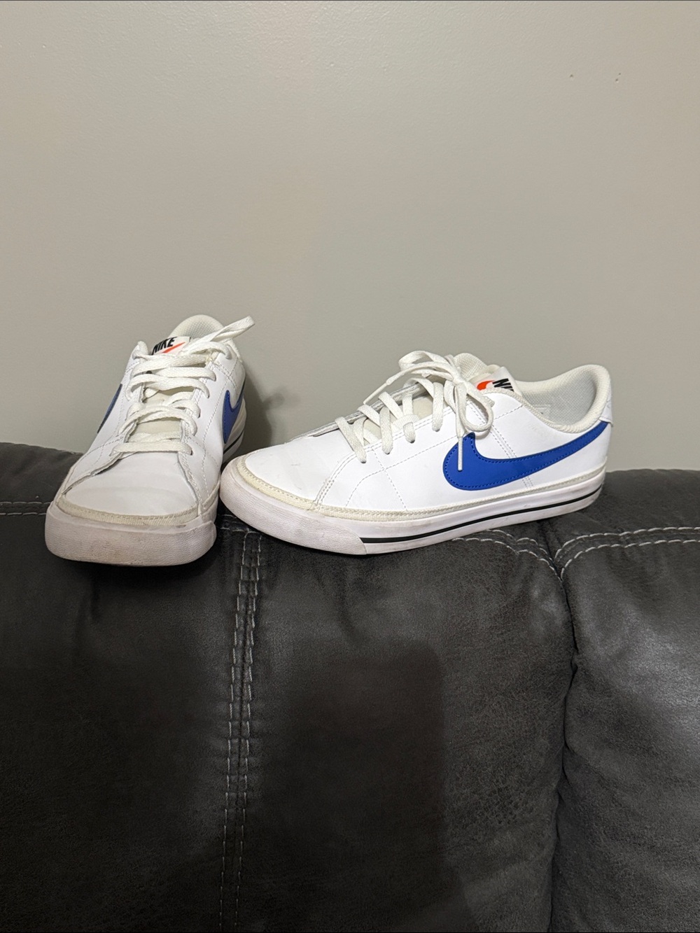 Nike Kids White Sneakers with Blue Swoosh